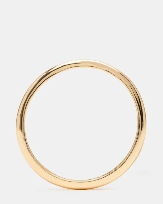 Cienka bransoletka typu bangle w kolorze złotym