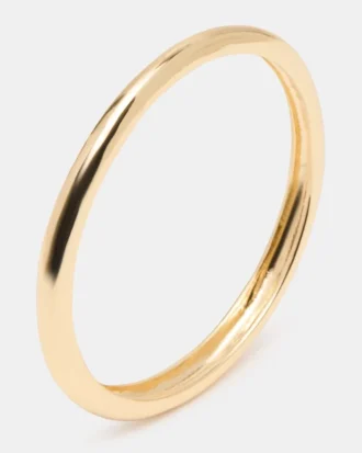 Cienka bransoletka typu bangle w kolorze złotym